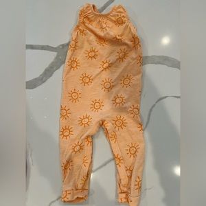 Sleeveless romper, sunshine print